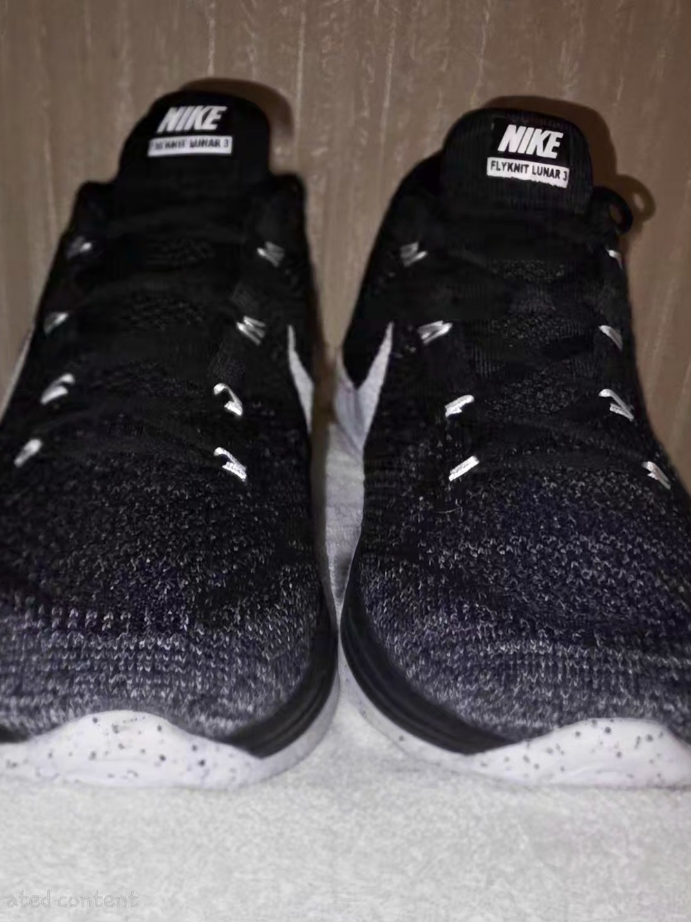 Nike Womana Black and White Flyknit Lunar 3 Sneakers